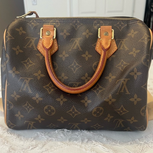 Louis Vuitton
LV Monogram Speedy 25 2007 - Picture 3 of 17